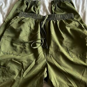 green joggers with pockets